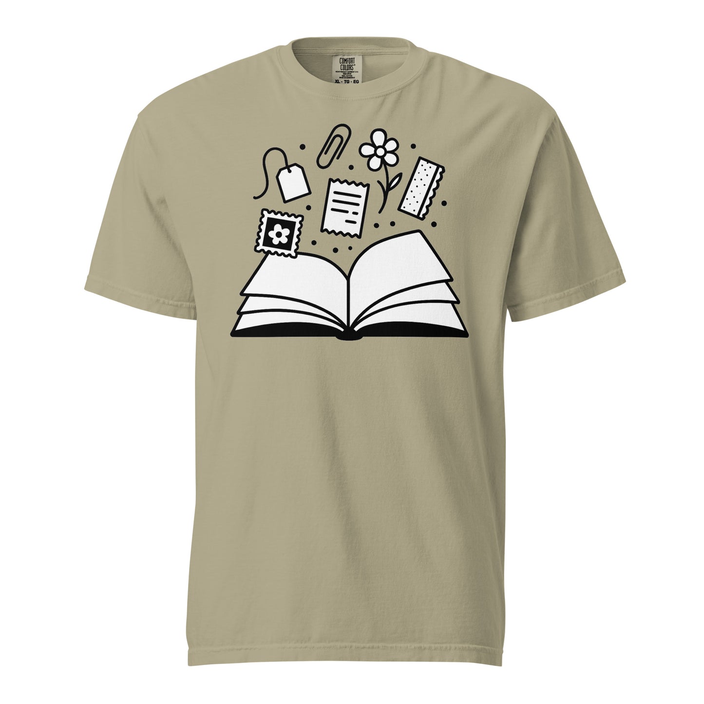 Beige t-shirt with black graphic design of an open book and various icons on a white background