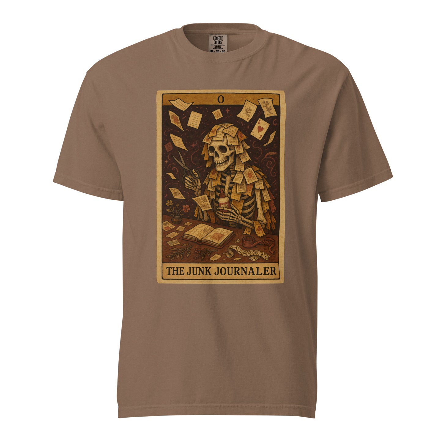 Junk Journaler Tarot Card T-shirt in Espresso featuring a junk journaling skeleton covered in paper scraps.